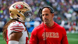 Robert Saleh talks to his player