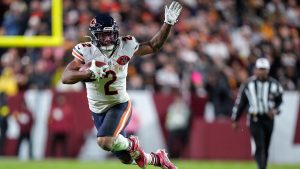 DJ Moore jumps past defender