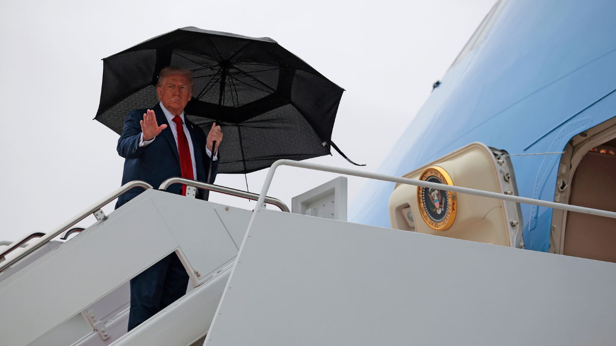U.S. President Donald Trump boards Air Force One