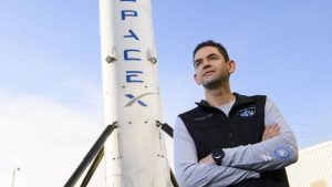 Inspiration4 mission commander Jared Isaacman, founder and chief executive officer of Shift4 Payments, stands for a portrait in front of the recovered first stage of a Falcon 9 rocket at Space Exploration Technologies Corp. (SpaceX) on February 2, 2021 in Hawthorne, California.